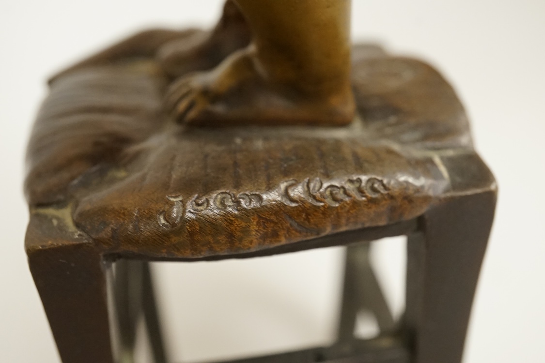 Juan Clara, a figure of a girl on a stool, 21.5cm high